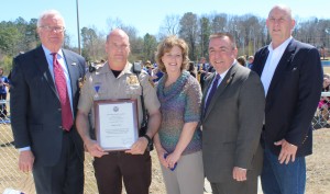 Sheriff Chris Curry, Deputy David Morrow, Patti Morrow, John Samaniego, and Principal Bill Harper.
