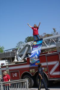 Elvin Hill Elementary Lighthouse School Banner on the Firetruck photo