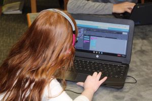Middle School Student coding 