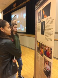 Students look at Holocaust Exhibit photo